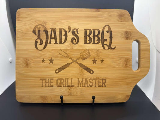 Dad’s BBQ – 9” x 6” Engraved Bamboo Cutting Board with Handle